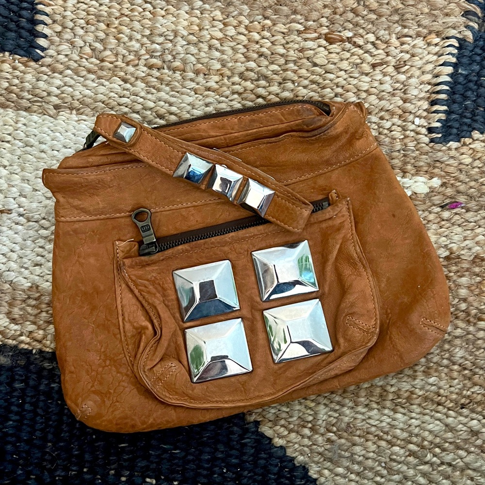 TYLIE Malibu clutch / wristlet - genuine grain leather + chrome studs
